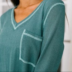Teal long sleeve knit top